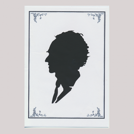 
        Front of silhouette, with man looking left, in suit, in painted square frame.